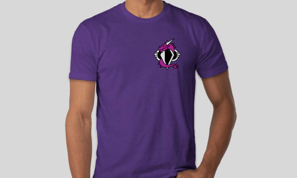 Dovah Design t-shirt design mock up from custom ink, showing "Dez" the dragon imprint on front left chest area of a purple t-shirt.