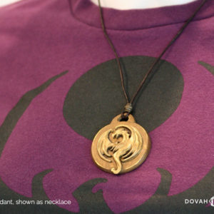 Elder Scrolls Online Elsweyr logo, gold resin cast pendant necklace. Shown as a necklace on display mannequin. Logo depecits a drake symbol on leather tie with hook and bar closure.