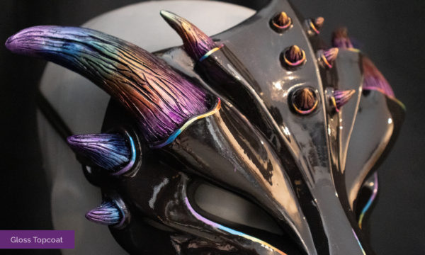 Closeup detail of the rainbow horns of the "glossy" dragon mask.
