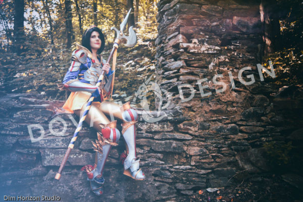 Sample image of Disney cosplay, the Snow White Knight, color photo print. Dovah Design in her Snow White cosplay, sitting on an old stone wall.